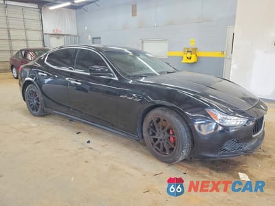 Czwarte zdjęcie samochodu z boku: 2014 MASERATI GHIBLI VIN:ZAM57XSA4E1112149 - miniatura