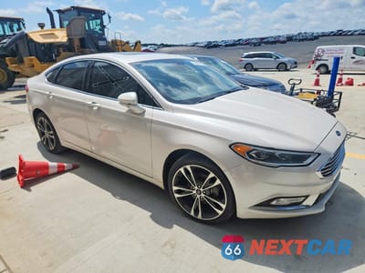 Czwarte zdjęcie samochodu z boku: 2017 FORD FUSION TITANIUM VIN:3FA6P0D96HR209145 - miniatura