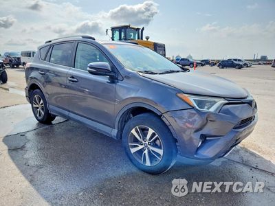 Czwarte zdjęcie samochodu z boku: 2017 TOYOTA RAV4 XLE VIN:JTMWFREV9HJ710568 - miniatura