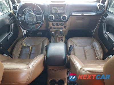 Zdjęcie 8 z 13 samochodu: 2014 JEEP WRANGLER UNLIMITED SAHARA VIN:1C4HJWEG9EL322926 - miniatura