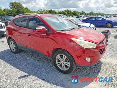 Czwarte zdjęcie samochodu z boku: 2013 HYUNDAI TUCSON GLS VIN:KM8JU3AC0DU774682 - miniatura