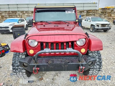Piąte zdjęcie samochodu w środku: 2012 JEEP WRANGLER UNLIMITED SAHARA VIN:1C4HJWEG2CL111886 - miniatura