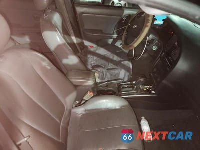 Zdjęcie 13 z 14 samochodu: 2006 HYUNDAI ELANTRA GLS VIN:KMHDN56D16U181522 - miniatura