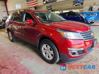 Czwarte zdjęcie samochodu z boku: 2014 CHEVROLET TRAVERSE LT VIN:1GNKVHKD1EJ329338 - miniatura