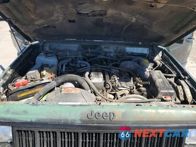 Zdjęcie 11 z 13 samochodu: 1995 JEEP CHEROKEE SPORT VIN:1J4FJ68S1SL575784 - miniatura