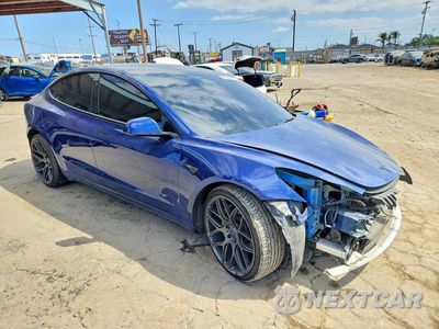 Czwarte zdjęcie samochodu z boku: 2022 TESLA MODEL 3 VIN:5YJ3E1EB5NF138334 - miniatura