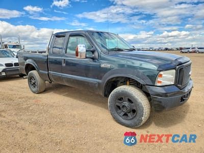 Czwarte zdjęcie samochodu z boku: 2006 FORD F350 SRW SUPER DUTY VIN:1FTWX31P16EC44402 - miniatura