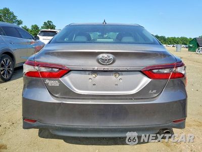 Zdjęcie 6 z 12 samochodu: 2021 TOYOTA CAMRY LE VIN:4T1C11AK3MU457895 - miniatura