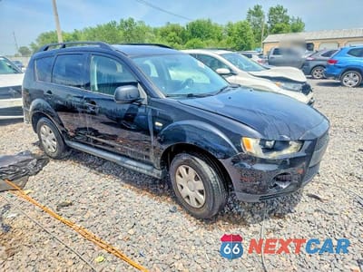 Czwarte zdjęcie samochodu z boku: 2011 MITSUBISHI OUTLANDER ES VIN:JA4AS2AW1BU013522 - miniatura