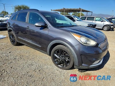 Czwarte zdjęcie samochodu z boku: 2018 KIA NIRO EX VIN:KNDCC3LCXJ5134451 - miniatura