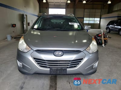 Piąte zdjęcie samochodu w środku: 2013 HYUNDAI TUCSON GLS VIN:KM8JU3AC0DU763603 - miniatura