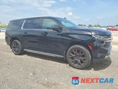 Czwarte zdjęcie samochodu z boku: 2023 CHEVROLET SUBURBAN C1500 LT VIN:1GNSCCKD7PR101468 - miniatura