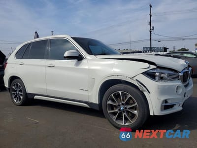 Czwarte zdjęcie samochodu z boku: 2018 BMW X5 VIN:5UXKR2C51J0X07724 - miniatura