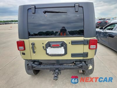 Zdjęcie 6 z 13 samochodu: 2010 JEEP WRANGLER SPORT VIN:1J4AA2D14AL216900 - miniatura