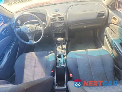 Zdjęcie 8 z 12 samochodu: 2001 TOYOTA COROLLA S VIN:1NXBR12E11Z509873 - miniatura