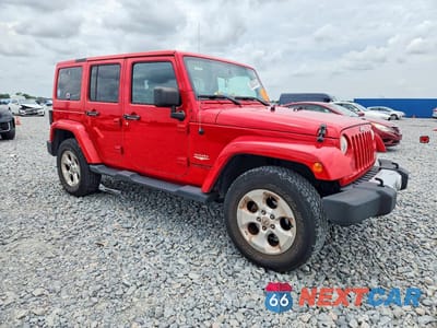 Czwarte zdjęcie samochodu z boku: 2015 JEEP WRANGLER UNLIMITED SAHARA VIN:1C4BJWEGXFL527971 - miniatura