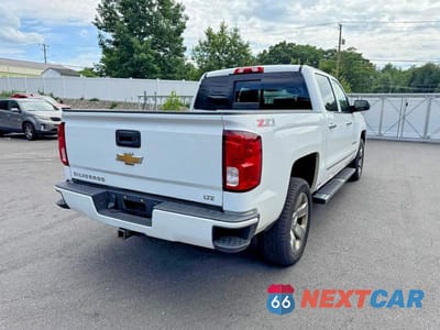 Trzecie zdjęcie samochodu z tyłu: 2017 CHEVROLET SILVERADO K1500 LTZ VIN:3GCUKSECXHG496653 - miniatura