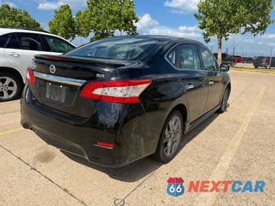 Czwarte zdjęcie samochodu z boku: 2015 NISSAN SENTRA SR VIN:3N1AB7AP5FY354763 - miniatura