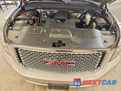 Zdjęcie 12 z 14 samochodu: 2016 GMC YUKON XL DENALI VIN:1GKS2HKJ9GR369926 - miniatura
