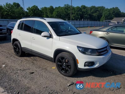 Czwarte zdjęcie samochodu z boku: 2017 VOLKSWAGEN TIGUAN S VIN:WVGBV7AX2HK049114 - miniatura