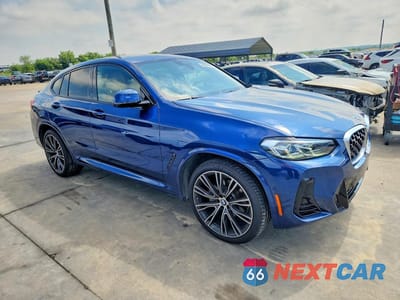 Czwarte zdjęcie samochodu z boku: 2022 BMW X4 XDRIVE30I VIN:5UX33DT03N9K73863 - miniatura