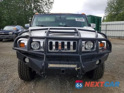 Piąte zdjęcie samochodu w środku: 2004 HUMMER H2 VIN:5GRGN23U74H100340 - miniatura