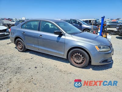 Czwarte zdjęcie samochodu z boku: 2012 VOLKSWAGEN JETTA BASE VIN:3VW2K7AJ6CM349861 - miniatura