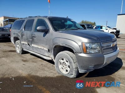 Czwarte zdjęcie samochodu z boku: 2012 CHEVROLET SUBURBAN K1500 LT VIN:1GNSKJE76CR264250 - miniatura