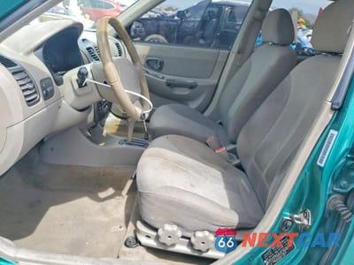 Zdjęcie 7 z 12 samochodu: 2001 HYUNDAI ACCENT GL VIN:KMHCG45C81U178604 - miniatura