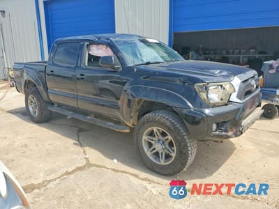 Czwarte zdjęcie samochodu z boku: 2013 TOYOTA TACOMA DOUBLE CAB VIN:5TFLU4EN8DX062708 - miniatura