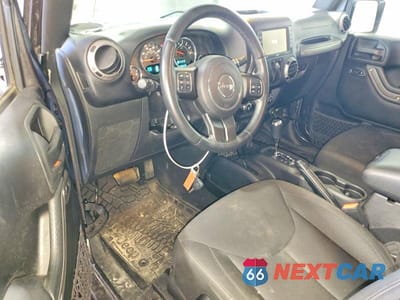 Zdjęcie 8 z 12 samochodu: 2016 JEEP WRANGLER SPORT VIN:1C4GJWAG9GL171025 - miniatura