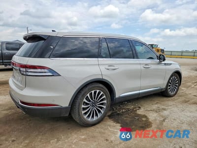 Trzecie zdjęcie samochodu z tyłu: 2022 LINCOLN AVIATOR RESERVE VIN:5LM5J7XC5NGL17467 - miniatura