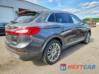 Trzecie zdjęcie samochodu z tyłu: 2017 LINCOLN MKX RESERVE VIN:2LMPJ8LR9HBL43937 - miniatura