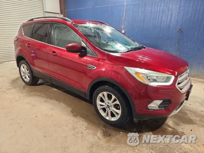 Czwarte zdjęcie samochodu z boku: 2017 FORD ESCAPE SE VIN:1FMCU9GD2HUC57546 - miniatura