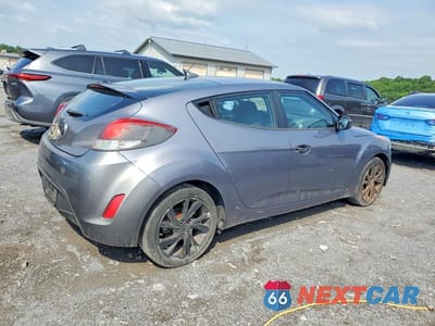 Trzecie zdjęcie samochodu z tyłu: 2016 HYUNDAI VELOSTER BASE VIN:KMHTC6AD0GU277142 - miniatura