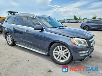 Czwarte zdjęcie samochodu z boku: 2014 MERCEDES-BENZ GL 450 4MATIC VIN:4JGDF7CE8EA312743 - miniatura