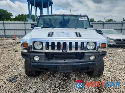 Piąte zdjęcie samochodu w środku: 2004 HUMMER H2 VIN:5GRGN23U74H122421 - miniatura