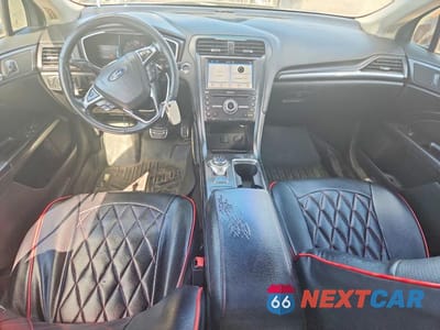 Zdjęcie 8 z 12 samochodu: 2018 FORD FUSION TITANIUM VIN:3FA6P0RU5JR206790 - miniatura
