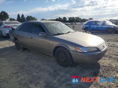 Czwarte zdjęcie samochodu z boku: 1999 TOYOTA CAMRY LE VIN:4T1BG22K5XU435965 - miniatura