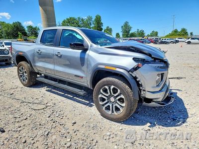 Czwarte zdjęcie samochodu z boku: 2024 GMC CANYON AT4 VIN:1GTP6DEK7R1249126 - miniatura