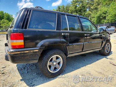 Trzecie zdjęcie samochodu z tyłu: 1993 JEEP GRAND CHEROKEE LIMITED VIN:1J4GZ78S6PC657360 - miniatura