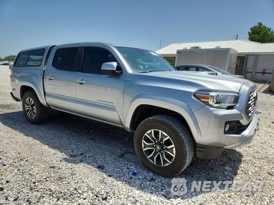 Czwarte zdjęcie samochodu z boku: 2023 TOYOTA TACOMA TRD SPORT VIN:3TMCZ5AN0PM587818 - miniatura