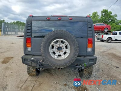 Zdjęcie 6 z 13 samochodu: 2003 HUMMER H2 VIN:5GRGN23U53H138681 - miniatura