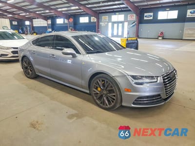 Czwarte zdjęcie samochodu z boku: 2016 AUDI A7 VIN:WAUWGAFC4GN009064 - miniatura