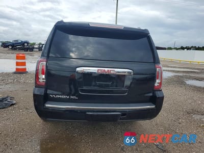 Zdjęcie 6 z 13 samochodu: 2019 GMC YUKON XL DENALI VIN:1GKS2HKJ8KR228497 - miniatura