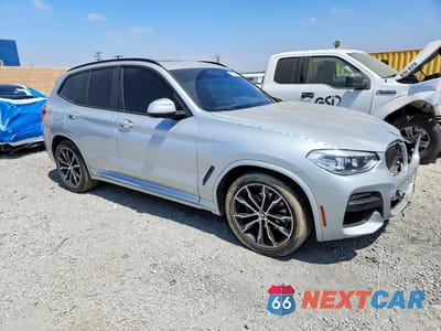 Czwarte zdjęcie samochodu z boku: 2021 BMW X3 XDRIVE30I VIN:5UXTY5C0XM9H61636 - miniatura