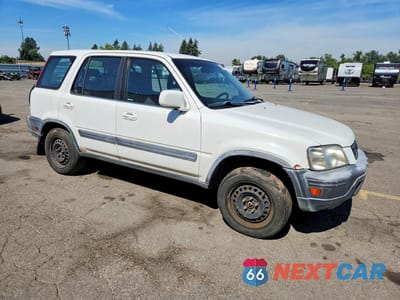 Czwarte zdjęcie samochodu z boku: 1999 HONDA CR-V EX VIN:JHLRD1862XC072291 - miniatura
