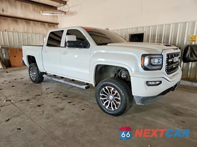 Czwarte zdjęcie samochodu z boku: 2018 GMC SIERRA K1500 SLT VIN:3GTU2NEC3JG306408 - miniatura