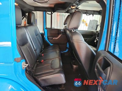 Zdjęcie 10 z 12 samochodu: 2018 JEEP WRANGLER UNLIMITED SAHARA VIN:1C4BJWEG0JL826202 - miniatura