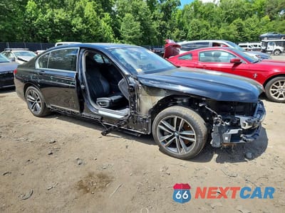 Czwarte zdjęcie samochodu z boku: 2020 BMW 750 XI VIN:WBA7U2C05LBX84823 - miniatura